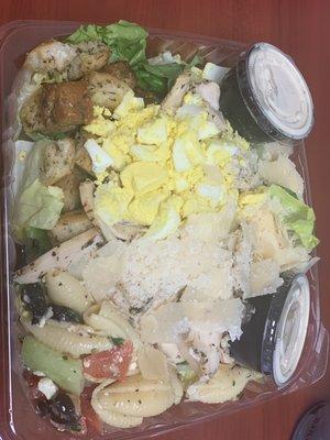 Chicken Caesar salad with added chopped egg