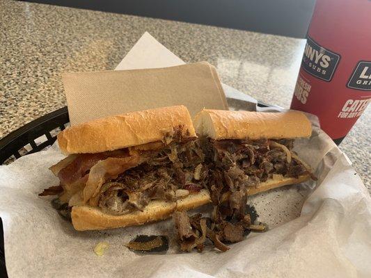 Philly cheesesteaks with bacon. Yum.  Show me a guy who doesn't like bacon and I'll show you a guy who questions his masculinity.