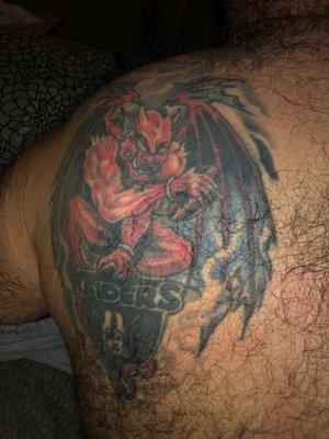 Raiders tattoo over 10 years ago done by Larry