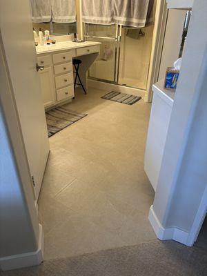 12 x 24 tile with 4" white baseboards