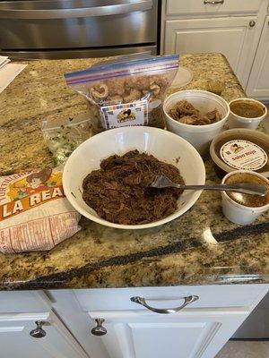 Barbacoa, carnitas, chicharrones, salsa and homemade corn tortillas.