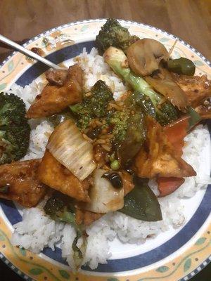 Mixed vegetables with tofu and Hunan sauce over rice