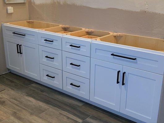 "Elevate your kitchen with our stylish white shaker cabinets - perfect for a modern and sleek look!"