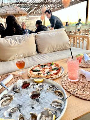 Oysters, Margherita pizza and cocktails