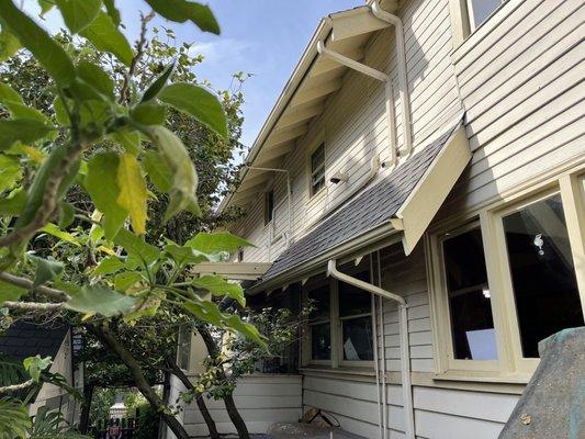 Newly repaired eave. Note the matching color and style.