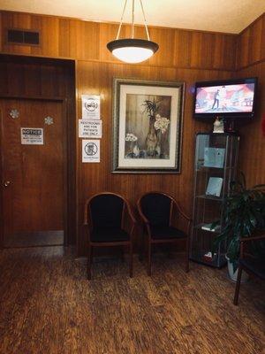 Waiting room with T.V. , great for patients.