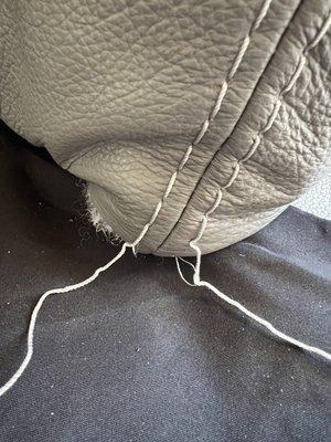 Unraveling leather sofa