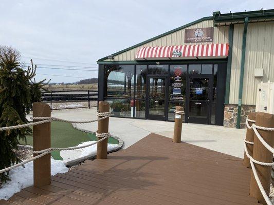 Boardwalk entrance to our Cafe featuring Rita's treats.