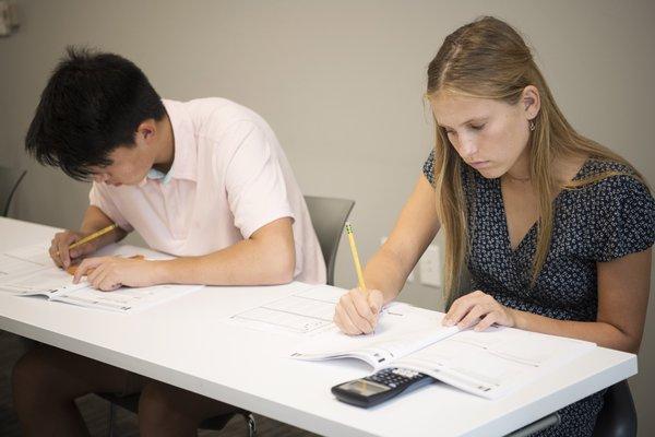 Students taking an in-person proctored practice test