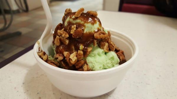 Potsachio ice cream with hot fudge and pecans