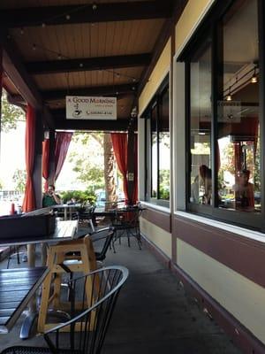 Outdoor eating area with a stunning view of a parking lot and the El Camino