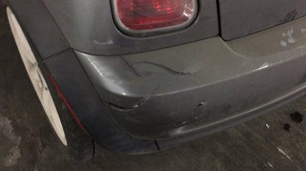 Damage to my car from apparent hit and run at 1 E 8th Street Garage (LAZ Parking).