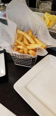 FF... upcharge for fries, and not a lot of them. Otherwise the burger comes with chips