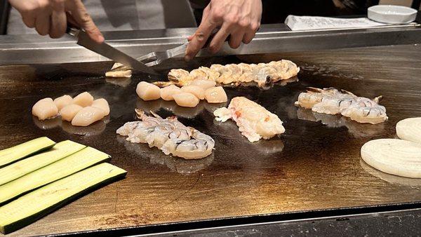 Chef is preparing seafood