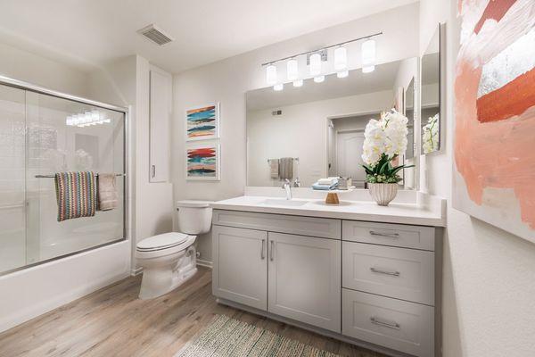 Quartz countertops in kitchen and bathroom