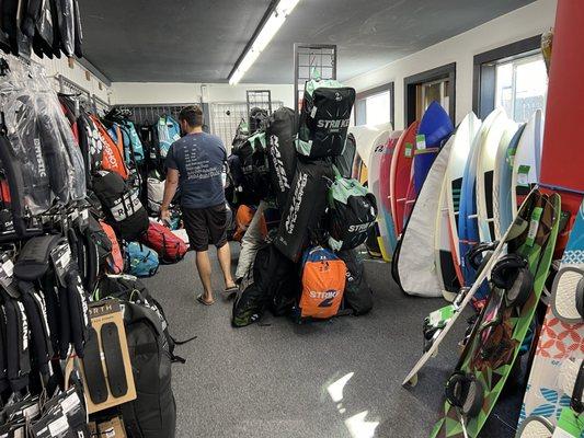 Consignment wings, kites, and surfboards