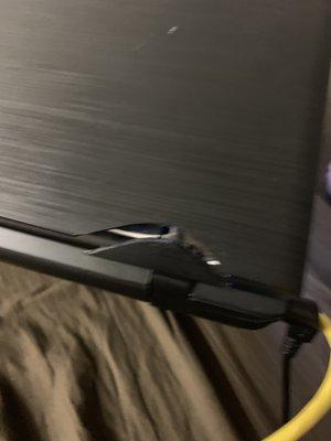 The back of the top of laptop has also cracked now and won't close.