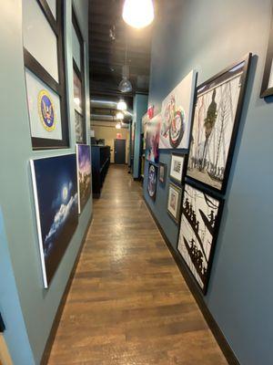 A hallway into the art world! We have art on the wall for sale! Come in and ask for pricing!