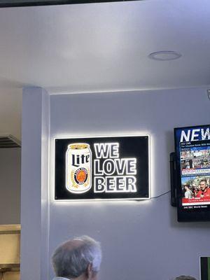 Beer sign above table at the Depot!