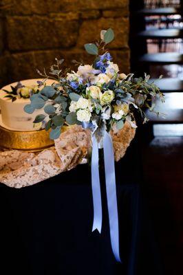 Bridal bouquet and Groom boutonnière provided by them.