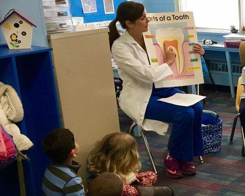 Dr. Jessica Clark teaching preschoolers about Dental Health.