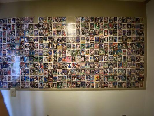 Mens room wallpapered in baseball cards