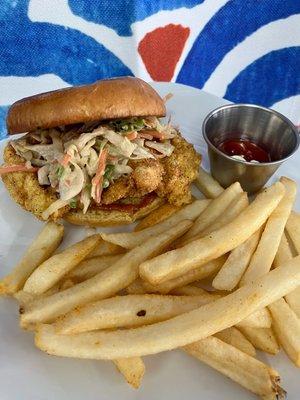 Crispy tallow Fried chicken sandwich. creamy Japanese slaw, hot gochugaru honey mustard, on toasted brioche with tallow fries