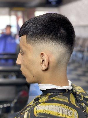 Clean haircut wit attention to detail.