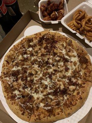 Large BBQ chicken ranch pizza, boneless honey BBQ chicken, and curly fries.