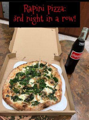 Rapini (aka broccoli rabe) with pine nuts, caramelized onions, and mozzarella. Absolutely THE best combination