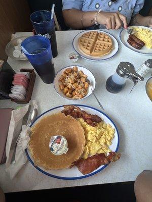 Deluxe Breakfast and side of Potatoes with onions