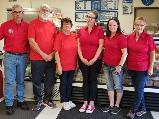 The staff celebrating Garys second anniversary!! In new Deli shirts.