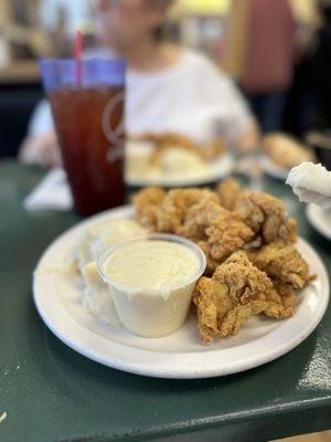 Chicken strip dinner with mashed potatoes, gravy, & fried okra. This picture makes me hungry still! So good!