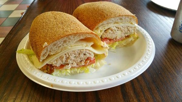 A delicious tuna sub with provelone, LTO & hot peppers... splitting it is a must.