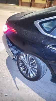 DAMAGED BUMPER AND TIRE