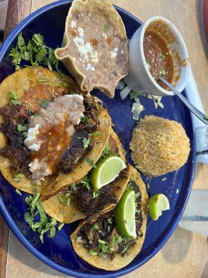 Tacos de Birria  They were okay. Rice was a little burnt tasting. Birria broth was good.