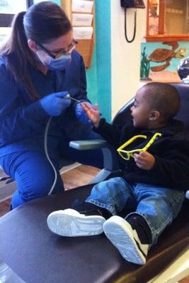 One of the hygienists, Miss Jessica, and a patient.