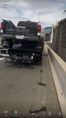 Big pick up truck towing a 40 foot trailer broke down traveling from Texas to Andrews Air Force  Base