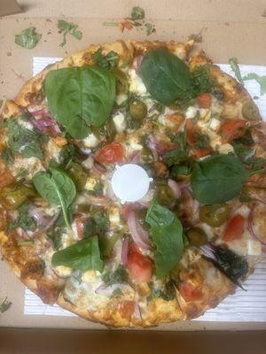 Indian style palak paneer pizza