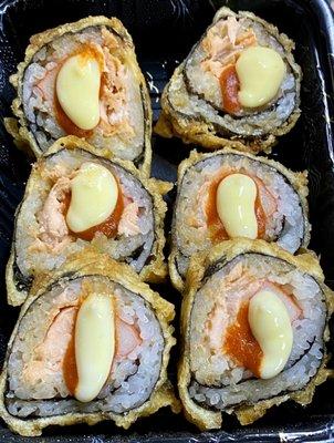 Dynamite Roll (Salmon, krabmeat, asparagus, deep fried, weed sauce, hot sauce, mayo) $6.95