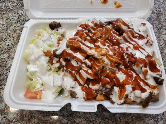 Mixed platter with chicken, lamb & white sauce...i added the hot sauce $9