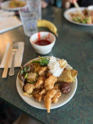 Plate #1! Mongolian beef, veggie stir-fry, sweet & sour chicken, rice, fried zucchini (tempura), kung pao chicken, and a meatball.