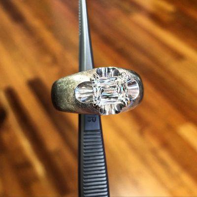 Emerald Cut Crisscut diamond set into custom solitaire ring