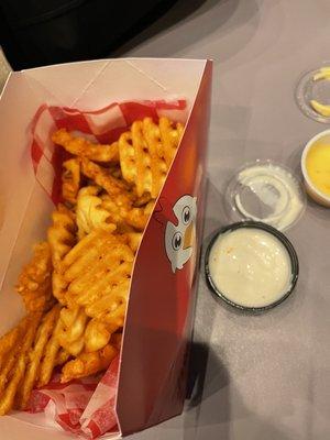 Seasoned waffle fries and cheese