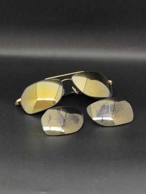 Custom lens upgrade. Polarized grey tint with a gold mirror   coat. As experts we can do what your heart desires, GET YOUR FIX!