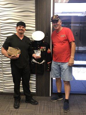 Tooth Corps owner/dentist Dr. Gary M. Gwilt with his fellow Marine Veteran Frank!