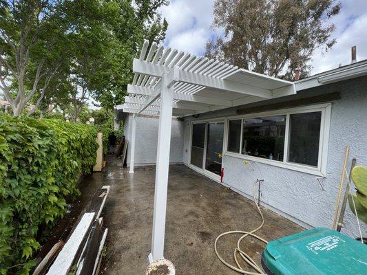 Patio cover half covered and half with pickets