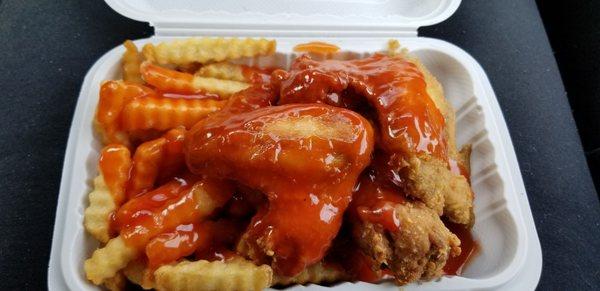 3 piece Chicken Wings with French Fries. Mumbo Sauce on everything