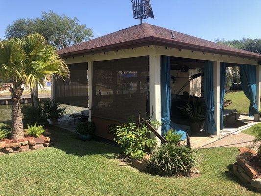 Screened boathouse/man cave. Added screening and the man cave was ready for grilling and chilling with the Big Green Egg!