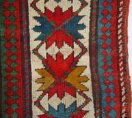 Antique tribal Caucasian rug rewoven and repaired,